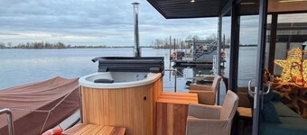 Exclusive Houseboat 12 x 5 m with sauna and hot tub