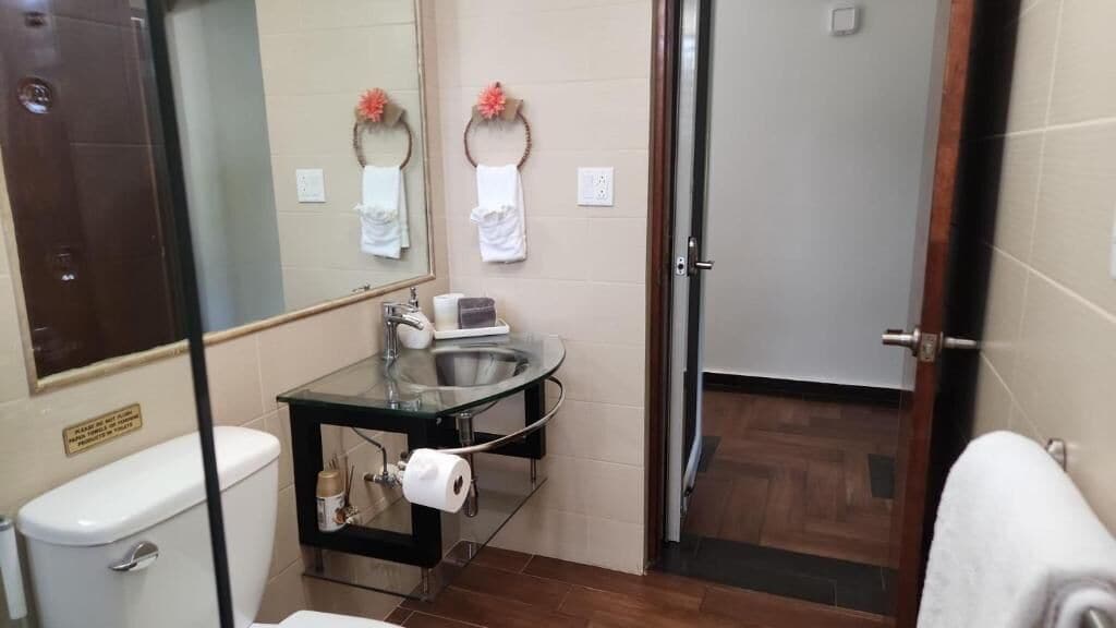 Superior Double Room, Pool View | Bathroom | Hair dryer, towels, soap, shampoo