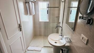 Hair dryer, towels, soap, toilet paper