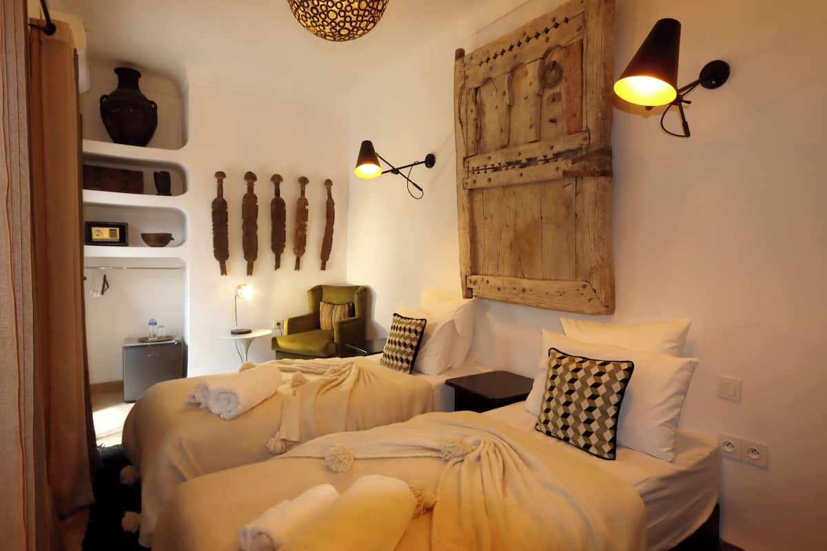 Twin Room, Courtyard View | In-room safe, blackout drapes, WiFi (free)