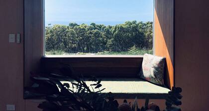 A superbly located House with sublime views over the National Park + ocean