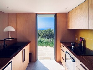 Private kitchen - A superbly located House with sublime views over the National Park + ocean (Bundeena)