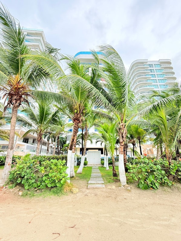 On the beach, beach umbrellas, beach towels - Caribbean Retreat, apartment 304 (Cartagena)