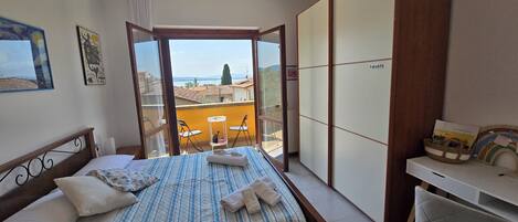 2 bedrooms, desk, iron/ironing board, travel crib