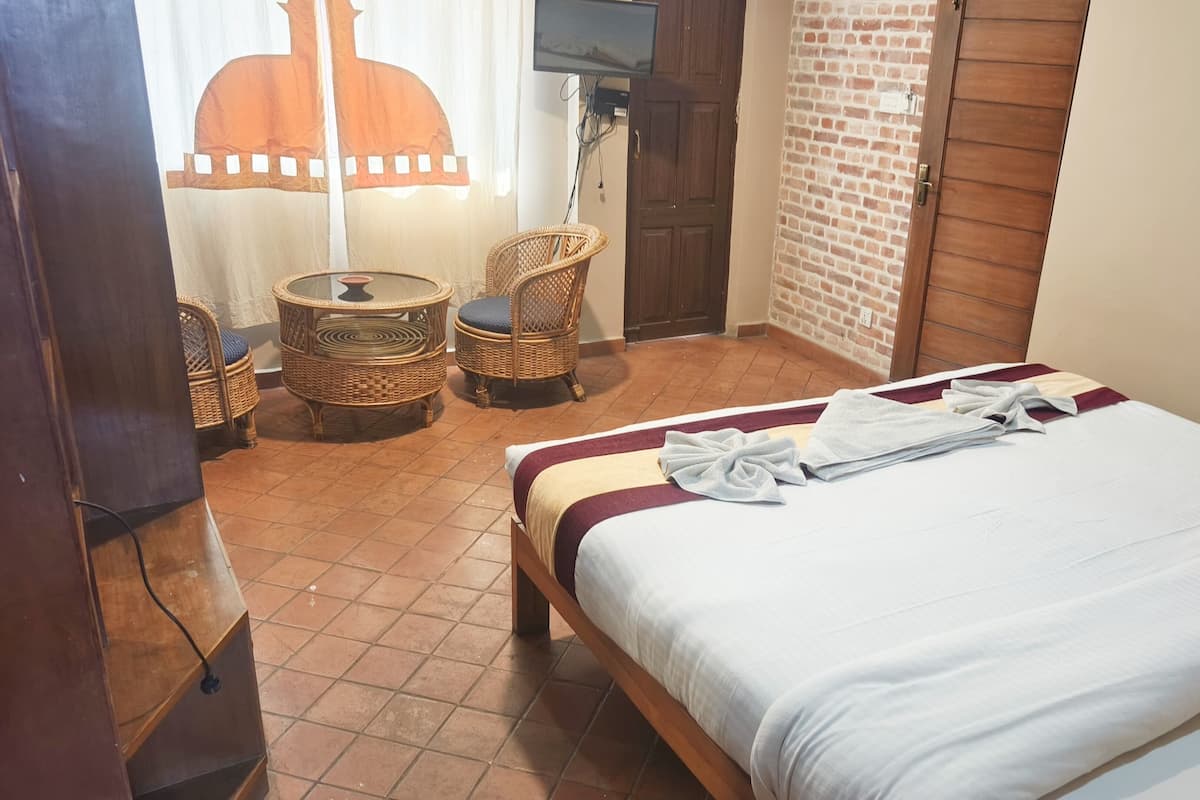 Deluxe Studio Suite, Balcony, City View | Individually decorated, individually furnished, desk, free WiFi