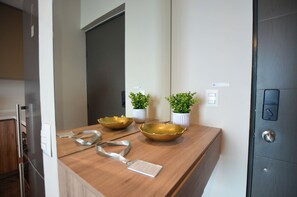 Business Suite, Balcony, City View | Living area | 50-inch Smart TV with cable channels, TV, streaming services