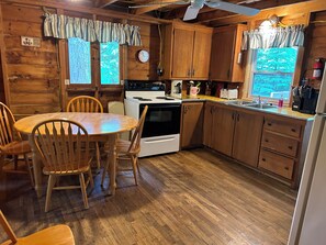 Fridge, microwave, oven, stovetop - Waterfront 3-Bedroom Cottage on Pleasant Pond in Turner, ME (Turner)