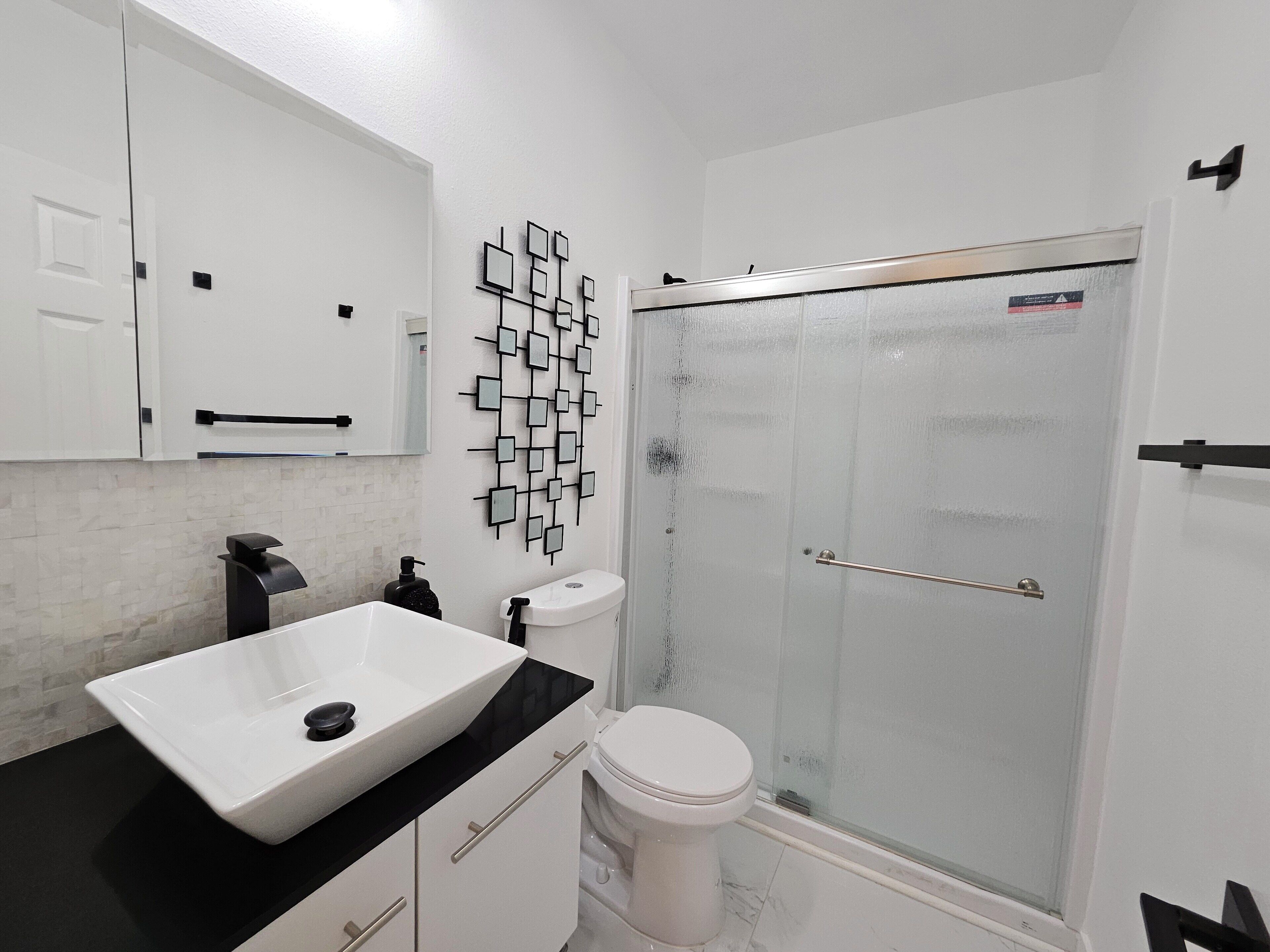 Shower, bidet, towels, soap