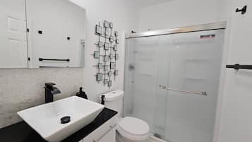 Shower, bidet, towels, soap