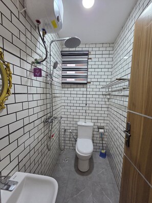 Shower, hair dryer, towels, soap