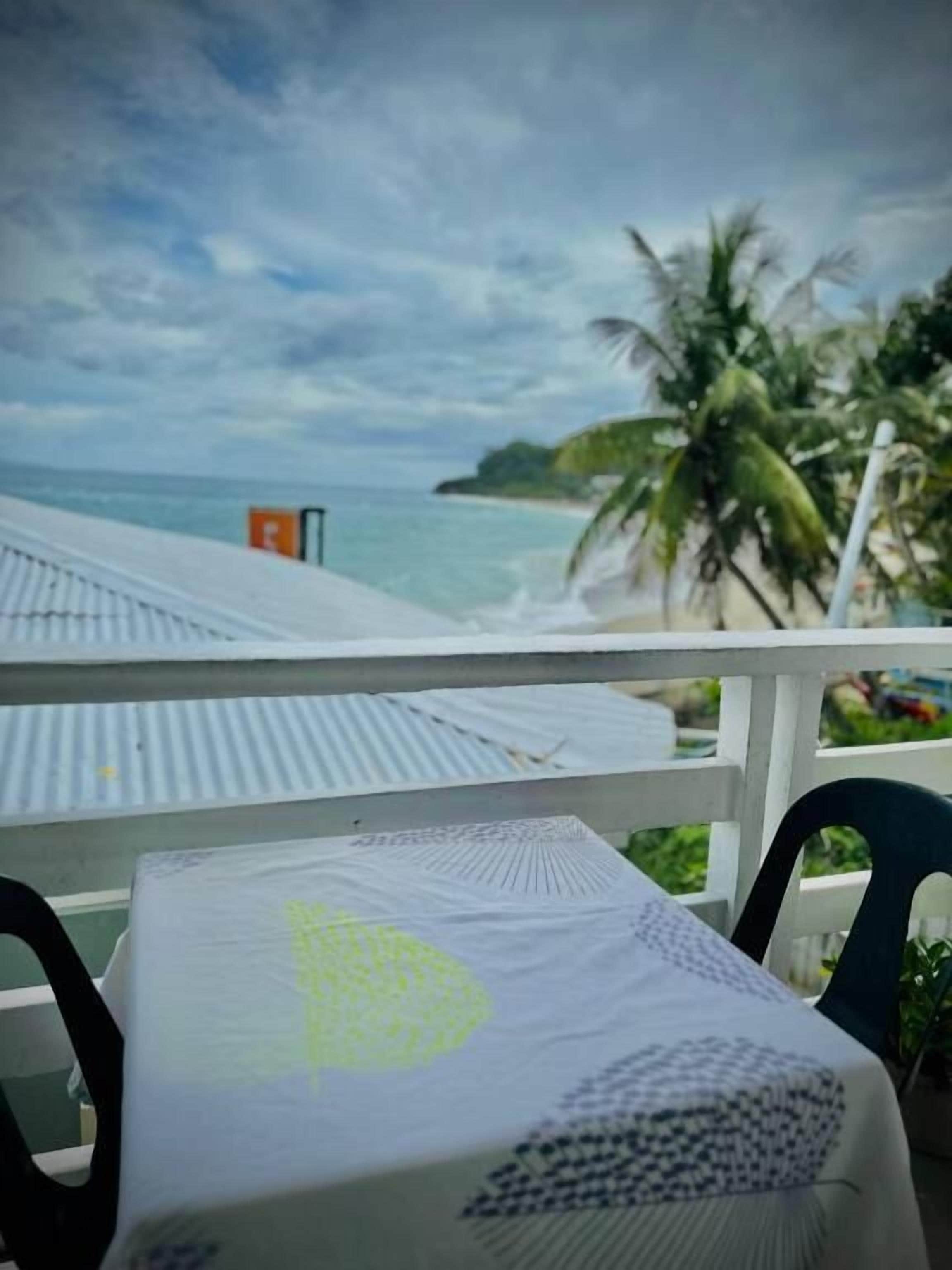 Deluxe Quadruple Room, Balcony | Outdoor dining