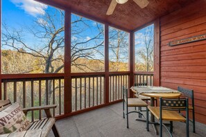 Outdoor dining - Ozark Hideaway Cabin • 2BR/2BA • Sleeps 6 • Jetted Tub • Covered Deck • Resort Pool (Branson)