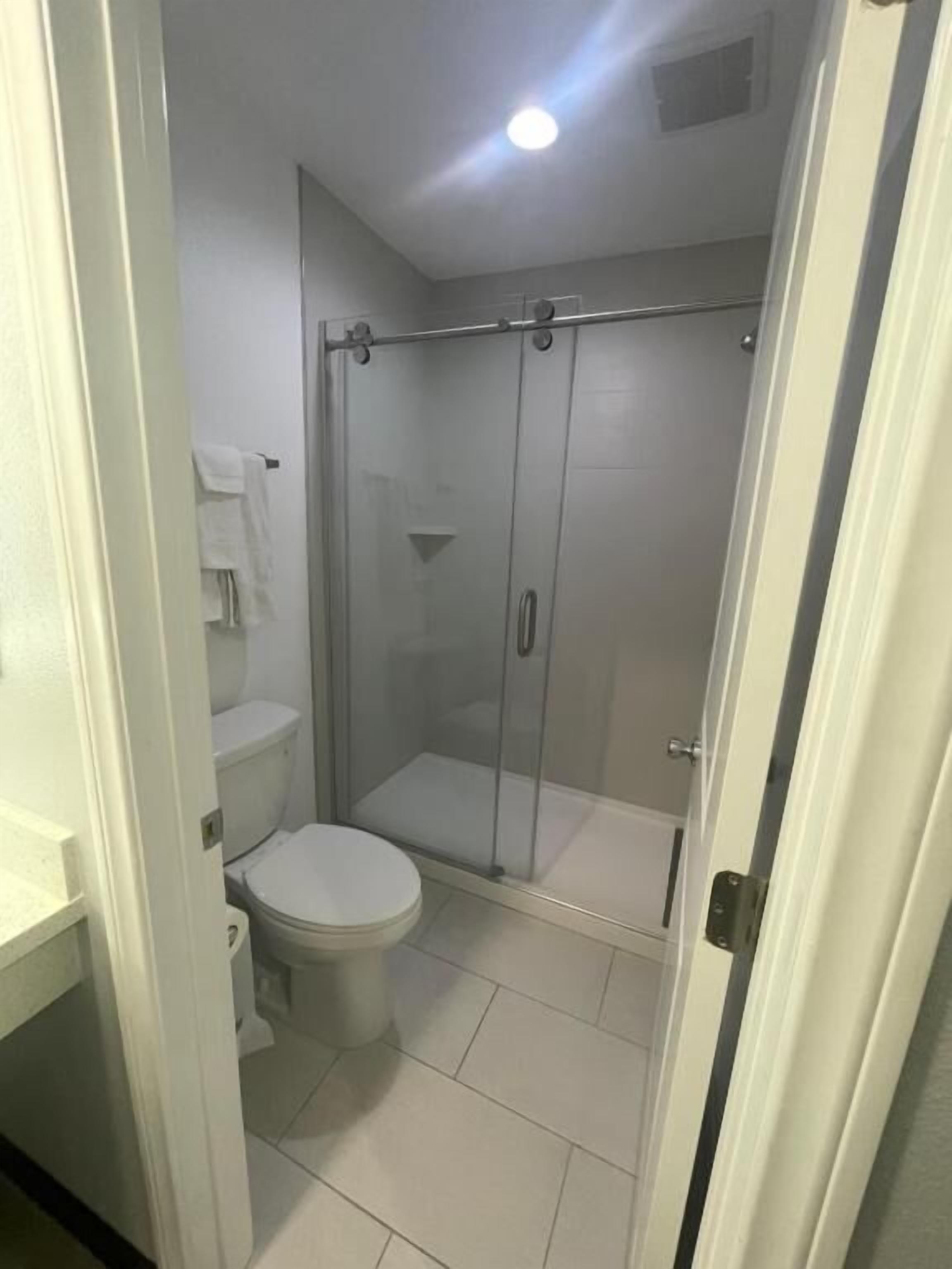 Shower, free toiletries, hair dryer, towels