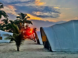 Private beach, white sand, free beach cabanas, beach umbrellas