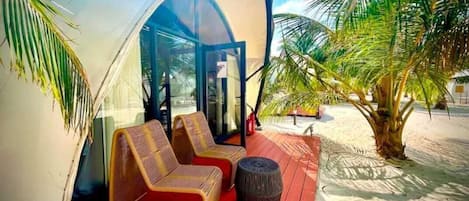 Deluxe Double Room, Balcony | Living area | 42-inch Smart TV with cable channels