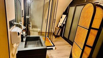 Shower, hair dryer, slippers, towels