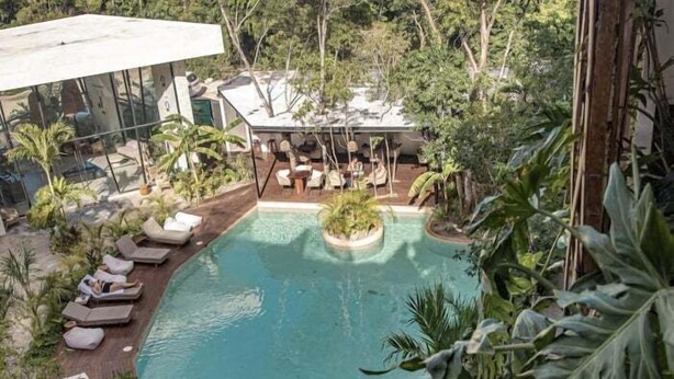 A pool area with lounge chairs and a small garden. - Dk Jade 3, Your Exclusive Refuge in Tulum (Tulum)