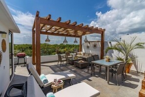 Outdoor dining - Akuti, rooftop terrace, and private pool in Aldea Zama-2 (Tulum)