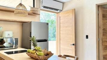 Fridge, microwave, coffee/tea maker, cookware/dishes/utensils