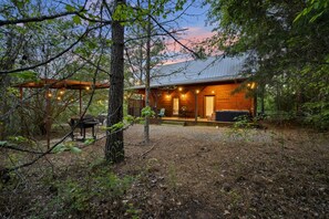 Terrace/patio - Honeycomb Cabin · Sweet & Cozy: Hot Tub, Fire Pit, Loft Retreat (Broken Bow)