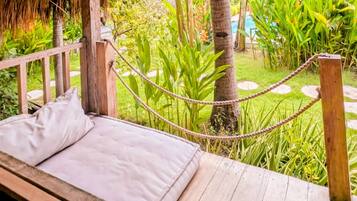 Deluxe Double Room, Garden View | Terrace/patio