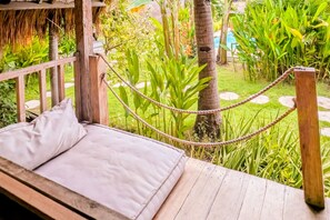 Kamar Double Deluks, pemandangan kebun | Teras/patio