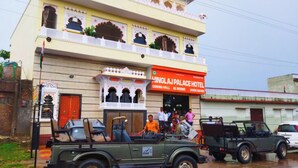 A building with a sign for 'Lingla Palace Hotel' featuring a dining hall and rooms. - Hinglaj Palace Hotel Jawai (Bijapur)