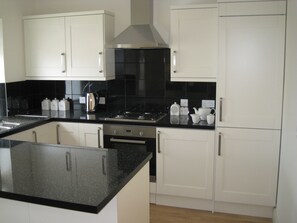 Dishwasher, high chair - 3 bedroom accommodation in Bradwell (Bradwell)