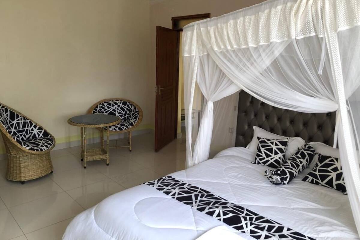 Kahden hengen deluxe-huone, näköala puutarhaan | Ilmainen Wi-Fi, vuodevaatteet