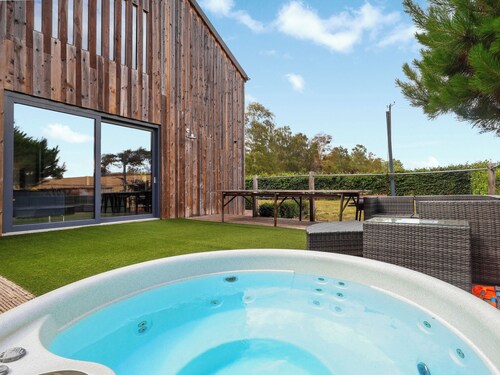 Stylish barn with hot tub, games room and countryside views.