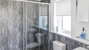 A modern bathroom with a glass-enclosed shower, a toilet, and a sink. - Cherry Blossom 43 - UK50711 (Fitling, near Burton Pidsea)