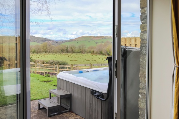 Hot tub | Towy Cottage - Ffynnongrech Farm Cottages, Talley, near Llandeilo