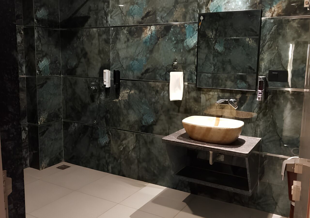 Habitación exclusiva | Baño | Toallas, jabón, champú y papel higiénico