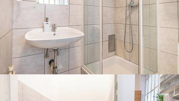 Basic Apartment | Bathroom | Shower, free toiletries, hair dryer, towels