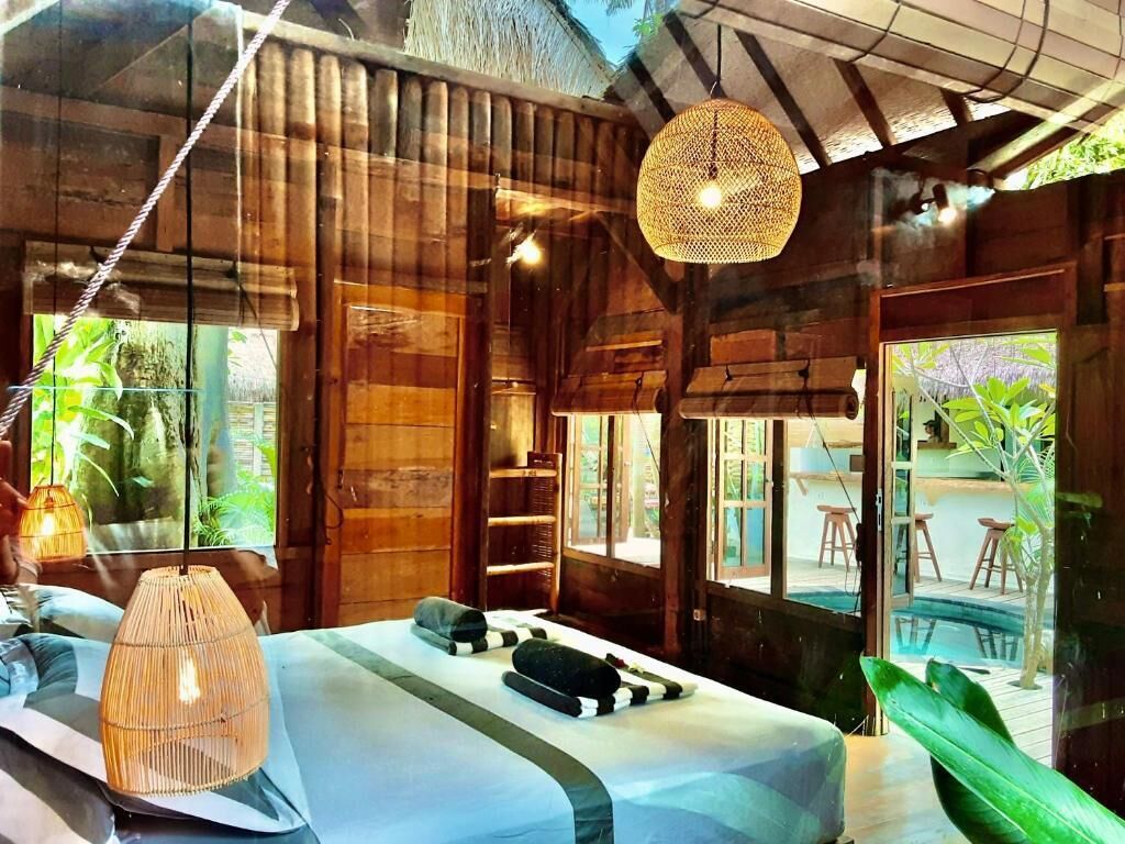 Chambre Double Deluxe, vue piscine | Coffres-forts dans les chambres