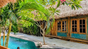 Chambre Double Deluxe, vue piscine | Vue sur le jardin