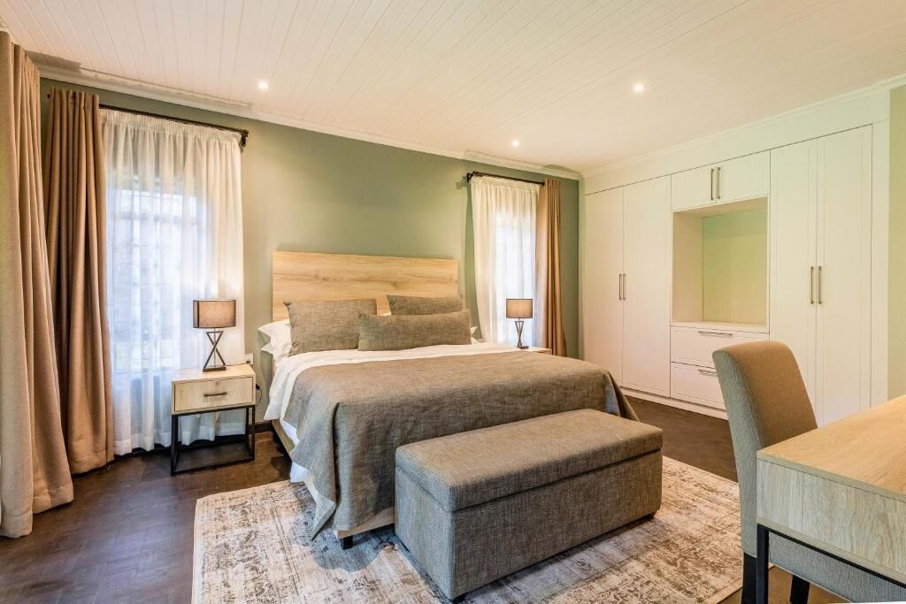 Superior Suite, Patio, Garden View | In-room safe, desk, laptop workspace, blackout drapes