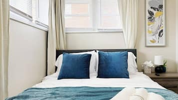 2 dormitorios, tabla de planchar con plancha, wifi gratis y ropa de cama