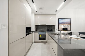 Private kitchen - FIRST CLASS |1BR| Luxury Comfort | Prime Location (Business Bay)
