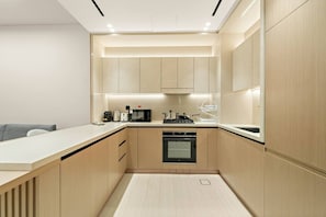 Private kitchen - FIRST CLASS | 2BR | Bright Haven Near Circle Mall (JVC)