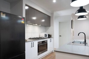 Fridge, microwave, oven, stovetop