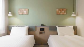 Premium bedding, in-room safe, laptop workspace, blackout curtains