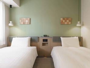 Literie de qualité supérieure, coffres-forts dans les chambres
