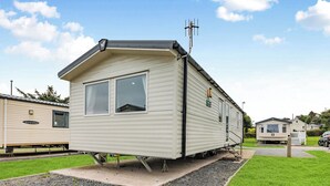 Unclassified image, 5 of 9, button - Silver Caravan with parking 6 (Skegness)