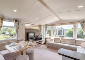 Unclassified image, 3 of 9, button - Silver Caravan with parking (Skegness)