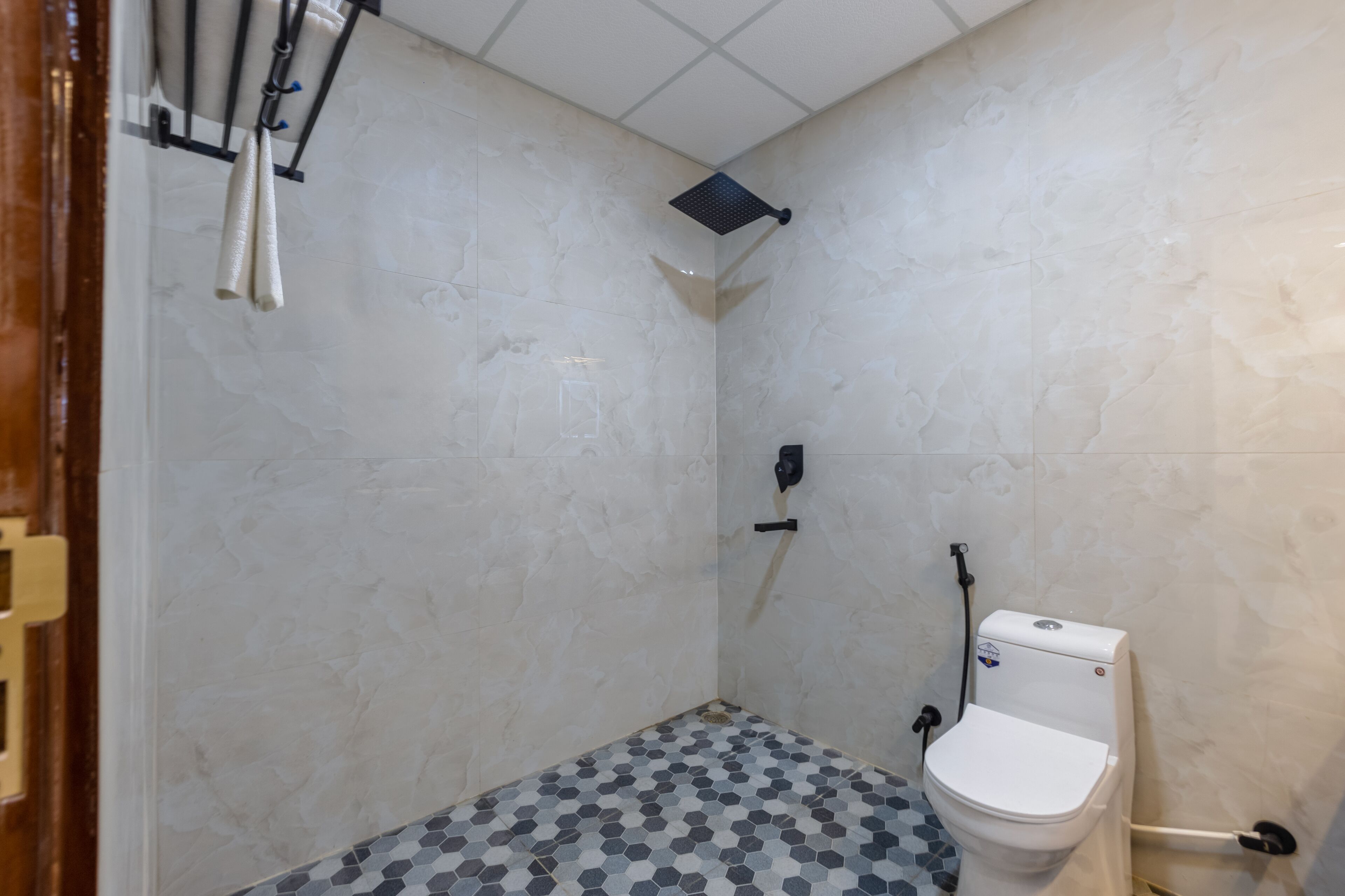 Shower, slippers, towels, soap