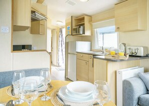 Unclassified image, 3 of 9, button - Bronze Caravan with parking 4 (Porthcawl)