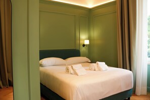 Kahden hengen standard-huone, näköala puutarhaan | Allergiatestatut vuodevaatteet, untuvapeitot, minibaari