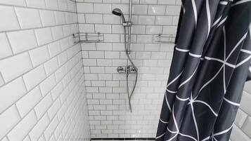 Shower, towels, soap, toilet paper