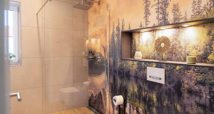 Vacation apartment near Bostalsee with infrared sauna, rain shower & balcony